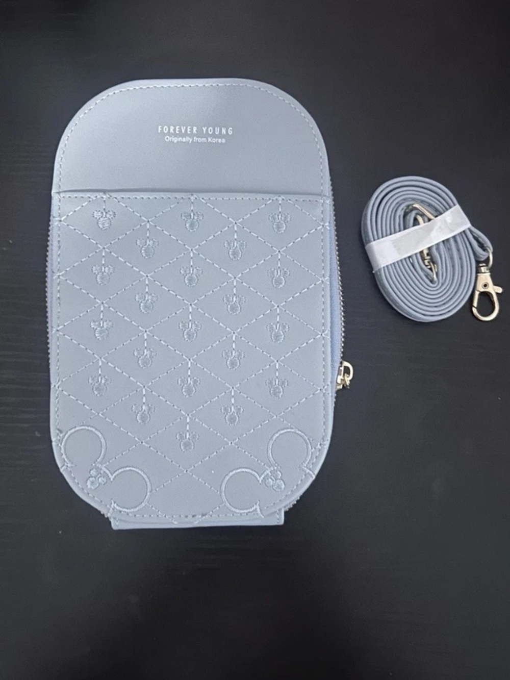 NWOT Forever Young Light Blue Quilted Crossbody Phone Bag